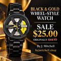 Black wheel-style watch with yellow accent and black bracelet