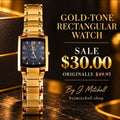 Gold-tone rectangular bracelet watch with dark navy dial