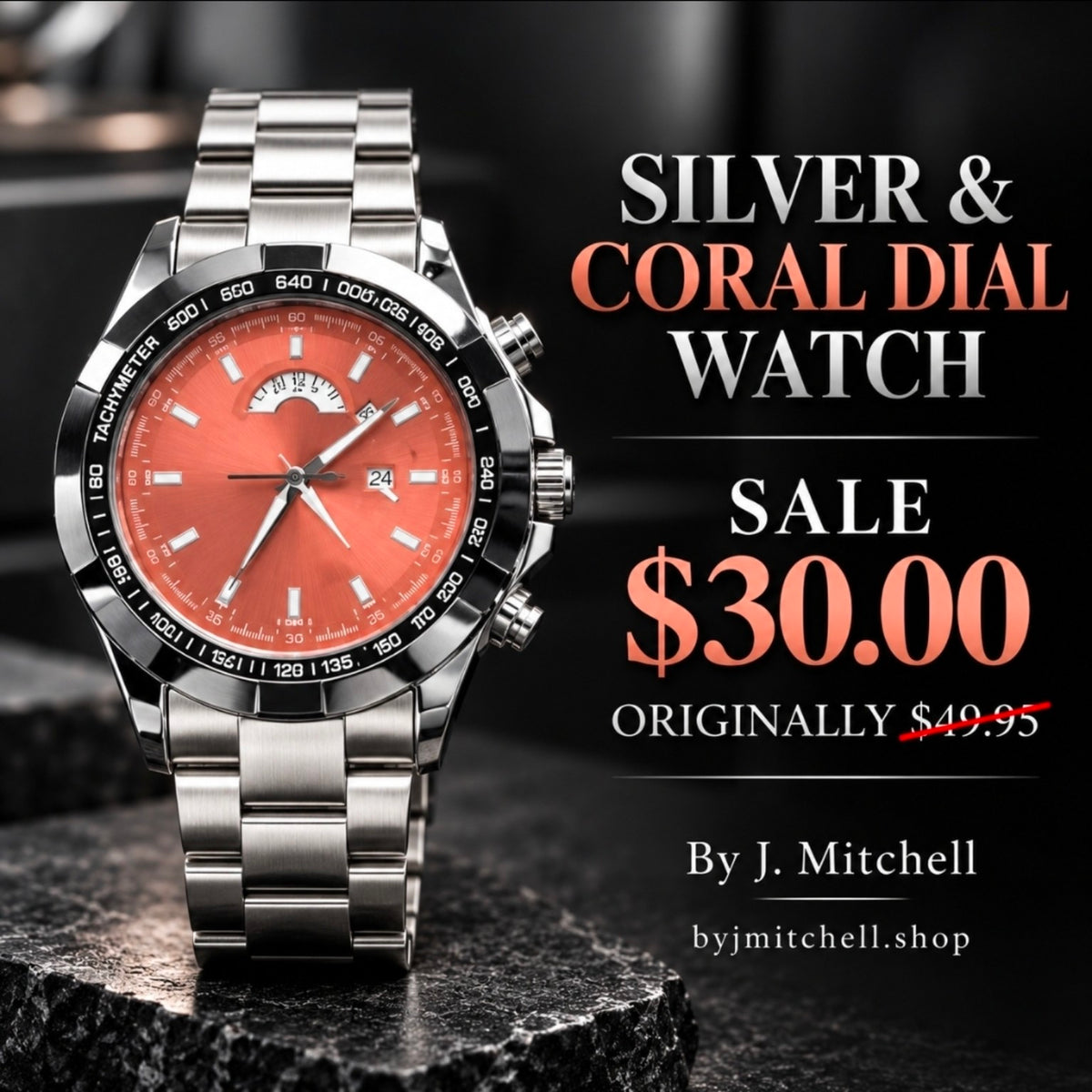 Silver-tone bracelet watch with coral dial and black bezel